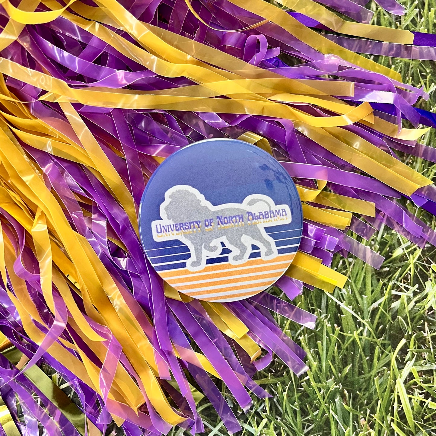 UNA Lion Stripe Button