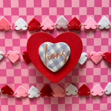 UNA Lions Gingham Heart Button