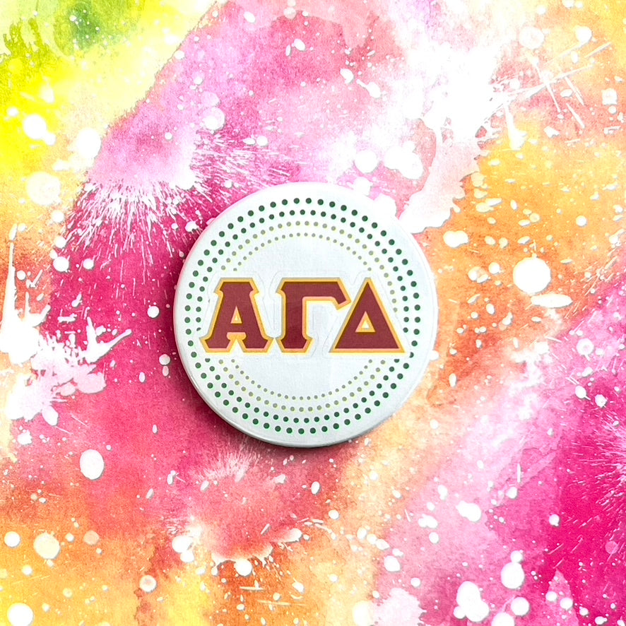 Alpha Gam (AGD) Button