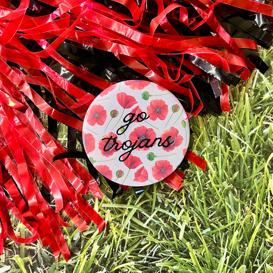 Floral Go Trojans Button