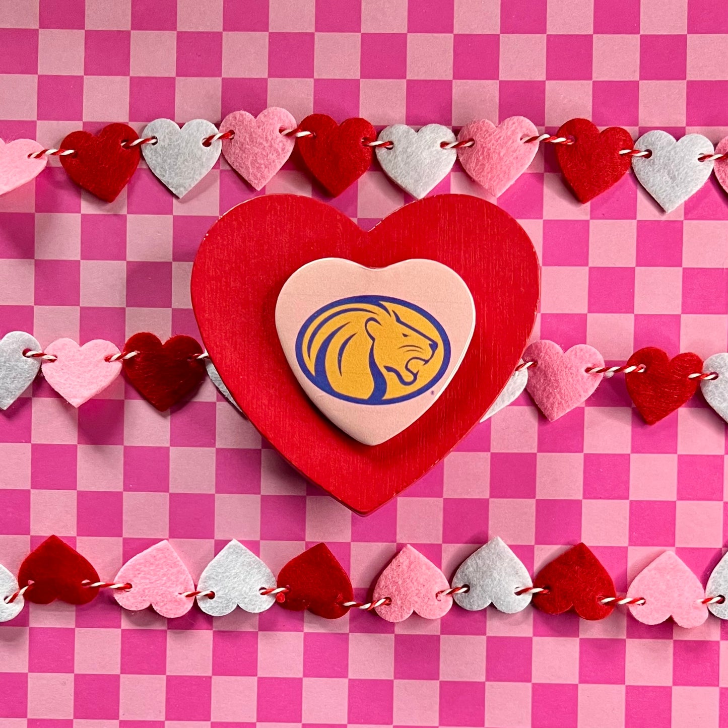 UNA Lions Logo Heart Button
