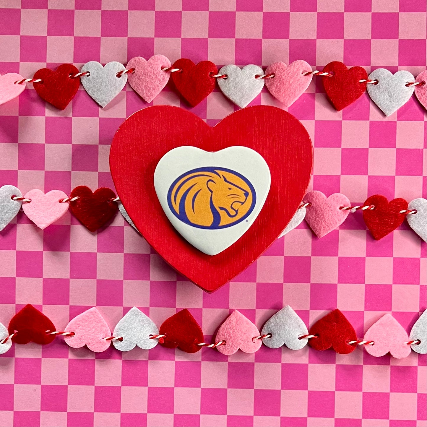 UNA Lions Logo Heart Button