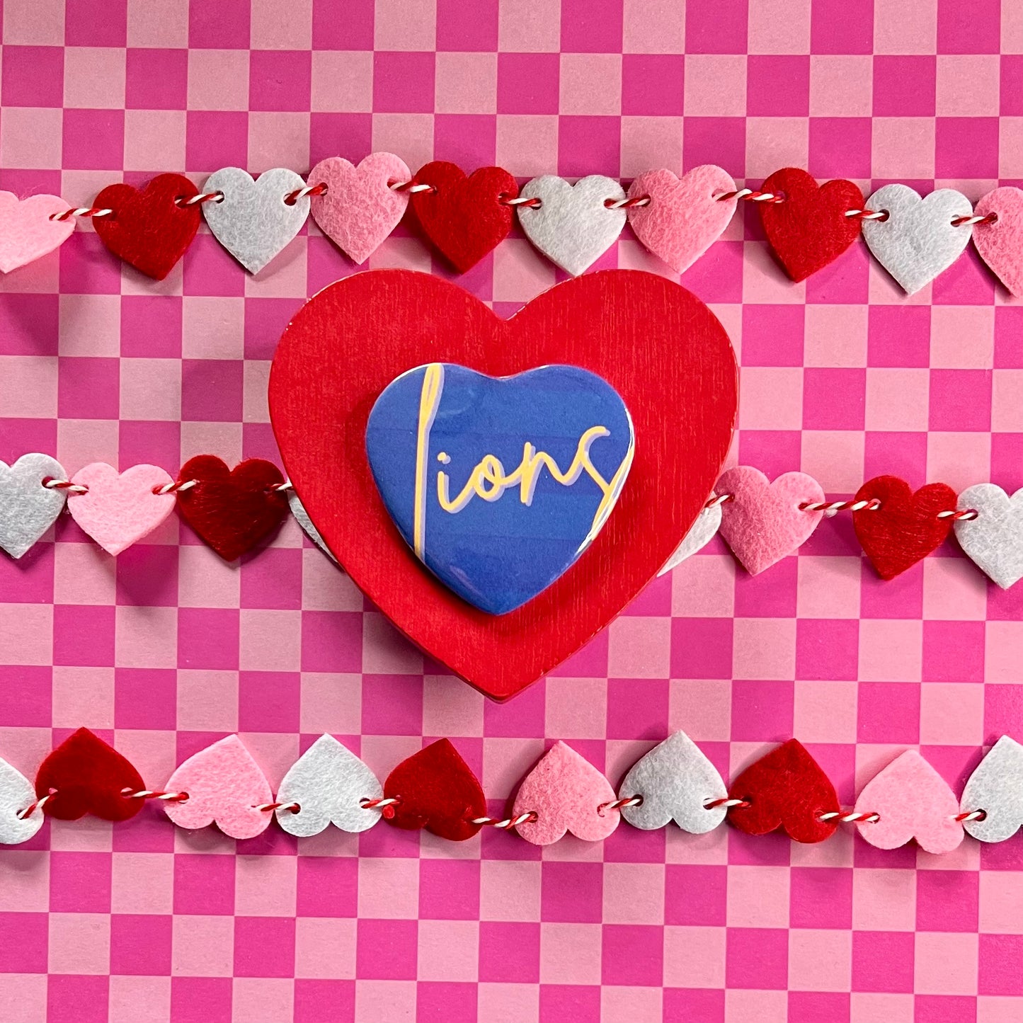 UNA Lions Script Heart Button