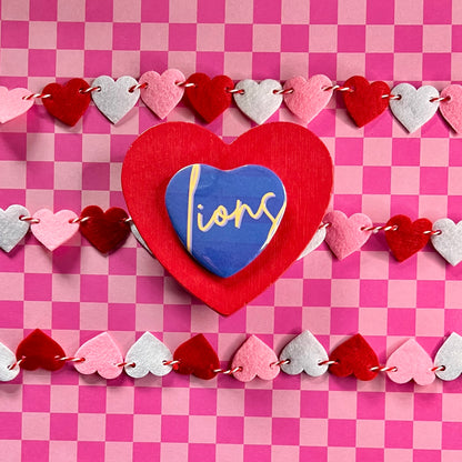 UNA Lions Script Heart Button