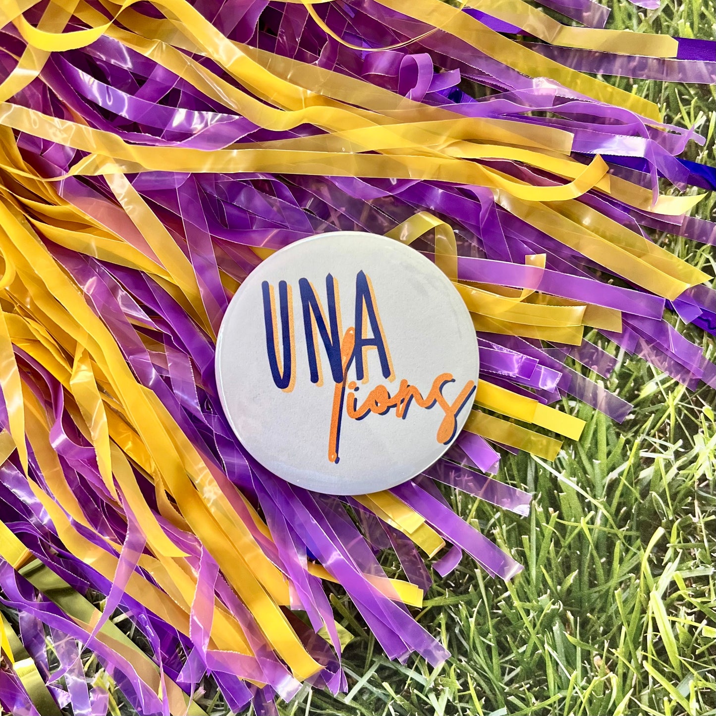 UNA Lions Script Button